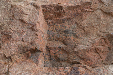 Molybdenite ore texture close-up. Contains feldspar, quartz, molybdenite, pyrite, chalcopyrite. Siberian natural resources deposit. Mineral stone surface abstract background.