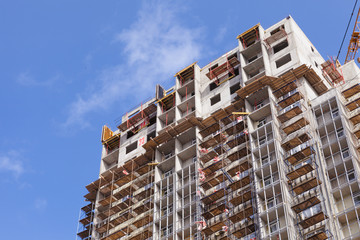 Fototapeta premium Construction of a new skyscraper or apartment building