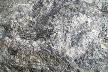 Gold antimony ore texture close-up. Contains quartz, sericite, carbonate, pyrite, antimonite,...