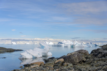  Antarctic landscape with mountains and reflection
