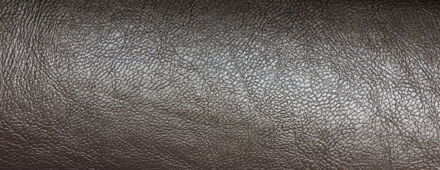Background texture of multi-colored corrugated leather with interesting colors