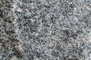 Urtite Aluminum ore texture close-up. Contains nepheline, aegirine-augite, titanium-augite. Siberian natural resources deposit. Mineral stone surface background.