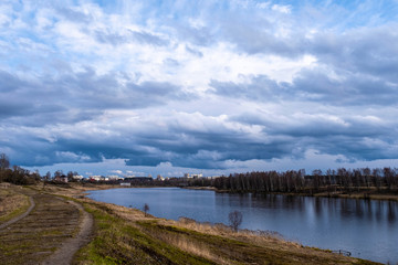 Fototapeta na wymiar The Uvod River in the city of Ivanovo with a beautiful cloudy sky.