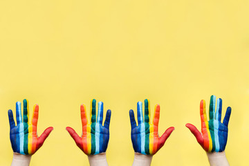 Hand painted as a rainbow flag. LGBTQ concept. Hand LGBT close up