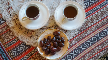 Traditional Arabian Coffee Served with Dates. Top View