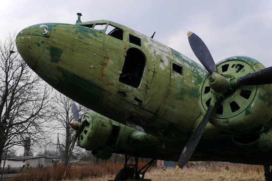 Abandoned old soviet airplane LI-2, analogue of Douglas DC-3. This instance suffered not so much from the passage of time as from the hands of vandals.