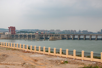 A dam and surrounding supporting buildings