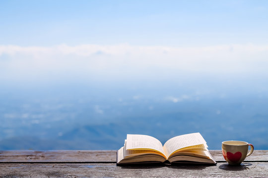 The Bible placed on the table was opened for learning to understand the Bible in order to pray to God and to ask God to protect himself and his family. The concept of Bible learning and faith in God