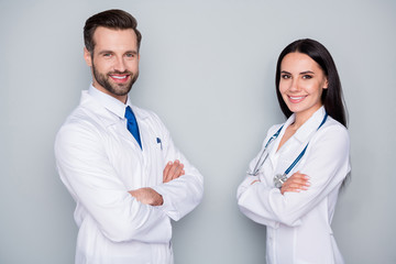 Photo of handsome doc guy professional lady patient consultation virology clinic listen client...
