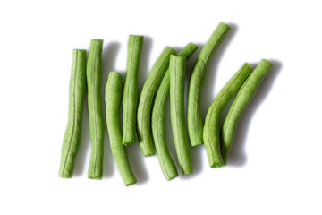 Top view of cut fresh green long beans or cowpeas isolated on white background. Healthy food. Macro & close-up.