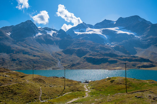 Looking over Lago Bianco, together with Lej Nair and Lej Pitschen one of three lakes at The Bernina Pass. It connects Swiss Engadin valley with Val Poschiavo and ends in the Italian town Tirano