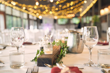 table set on a catering, banquet or wedding with bokeh light balls and chocolate