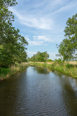 Fototapeta na wymiar Rural Landscape With River In North Germany