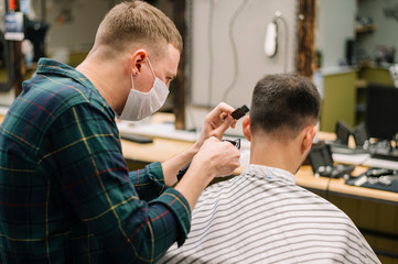 Side view of barber shop concept with medical mask