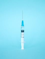 Injection with medication. Vaccine in a syringe. Cosmetic procedures. Preparation for injection. 