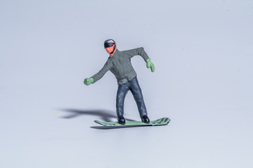 miniature figure of snowboarder