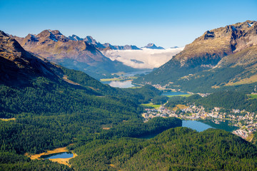 Panoramic view from Muottas Muragl (Graubünden, Switzerland) of the Upper Engadine Valley and the four Upper Engadine Lakes (Champfer, St. Moritz, Silvaplana, Sils). It's accessible by funicular 