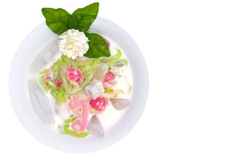 Top view Iced mixed dessert topping with jasmine flower isolated on white background. Clipping path. Summer dessert.