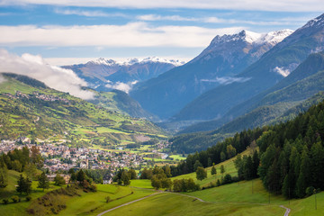 Fototapeta na wymiar Mountains surrounding Scuol, a village in the canton of Graubünden, Switzerland. It is situated within the Lower Engadin valley along the Inn River, at the foot of the Sesvenna Range.