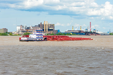 Towboat pushing barge near saint bernard port