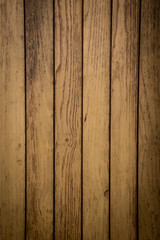 Vintage brown wood background texture. Vintage wooden bright vertical boards.