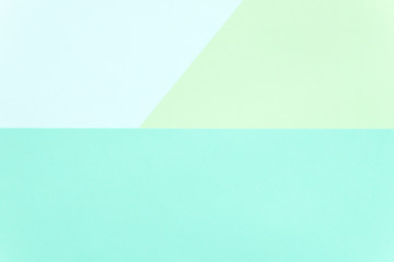 Bright color block paper background: turquoise, light blue and green. Copy space. Space for text....