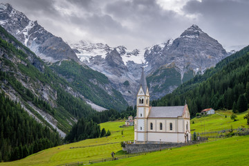 Fototapeta na wymiar In the valley Val Venosta (German: Vinschgau) in the region Alto Adige (German: Südtirol), surrounded by the mighty Ortler Group mountains the famous church of the small village of Trafoi can be found
