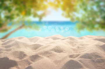 Fototapeta na wymiar Beautiful Summer exotic sandy beach with blur tree and sea on background