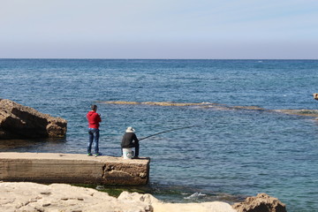 Fototapeta na wymiar fishing on the beach