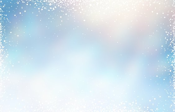 Wonderful winter blue light background decorated snow frame pattern. Glare blurred texture. Sun rays.
