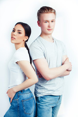 Fototapeta premium modern hipster guys together couple diverse nations, asian girl and caucasian blond boy isolated on white background, lifestyle people concept