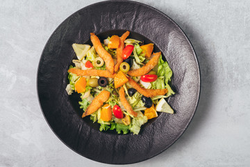 tasty salmon salad served on plate