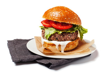 Beef hamburger with a mayonnaise dressing