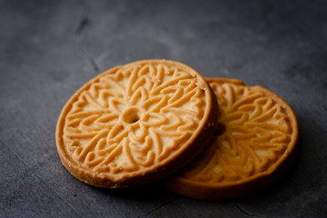 butter cookies isolated on black background top view