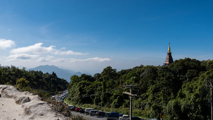 On Doi Inthanon, where there are many cars parked on the road during the cold season.