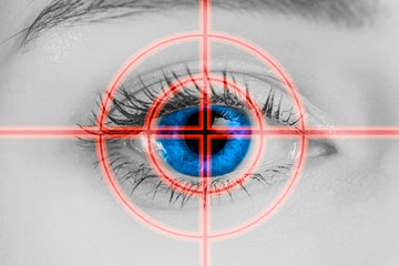Close-up of an eye. medicine, eyesight control, laser correction, people and health concept