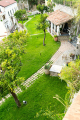 View of a wonderful garden organized on different levels and terraces wich face the ocean giving a special unique and intimate view. Located in southern italy in Salerno