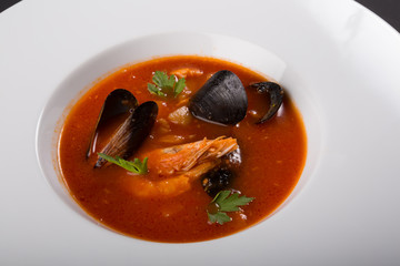 Spicy seafood soup with shrimps and mussels