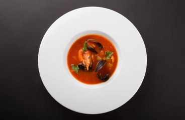 Spicy seafood soup with shrimps and mussels