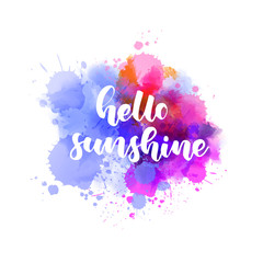 Hello sunshine - handwritten modern calligraphy lettering. Abstract background from watercolor splashes.