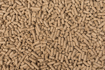 Granules of animal feed close up. Backgrounds  texture

