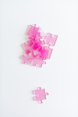 Frosted pink acrylic puzzle pieces 