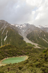 Glacier footprints over Blue Lake in the Southern Alps. Near Tasman Lake. South Island, New Zealand