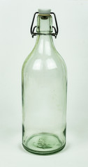 Real glass bottle isolated on white background