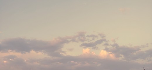 Fototapeta premium clouds in the sky with the colours of happiness 