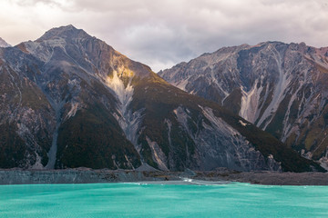 High mountains above the glacial lake. Southern Alps. South Island, New Zealand