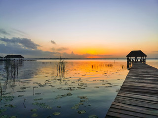 Fototapeta na wymiar Sunrise in Bacalar Lake, Quintana Roo, Mexico