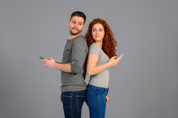 Nice young couple in the studio