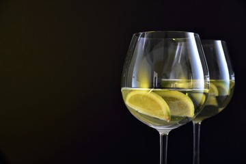 Glass of a cold cocktail drink with white wine