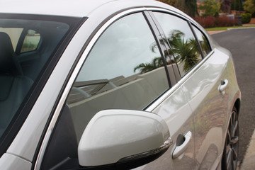 Side windows and mirror of a car